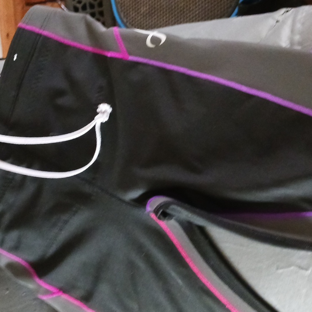 Black with pink and purple trim cwx leggings large. Dog friendly home. Insulated